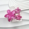 Three-piece plumeria hair claw set in magenta marble resin on a white display card - Marble-look Pink Set (including Card)
