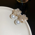 Macro shot of silver needle pearl earrings with snowflake-shaped zircon crystals - Snowflake Zircon Dangle Pearl (23#)