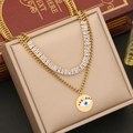 Double-layered gold necklace with blue eye pendant and zircon on vintage book display - Double Layer Evil Eye Necklace (1# Necklace)
