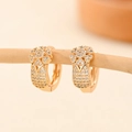 Detail of gold floral hoop earrings with sparkling zircons on a natural branch - EH217 Five Petal Flower