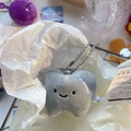Cute grey tooth plush keychain made of soft fabric with a silver bead chain - Grey Tooth