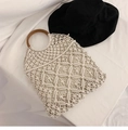 Minimalist cream woven cotton rope beach bag with round wooden handles and lining - White