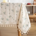 Beige cotton linen tablecloth with small daisy print and decorative fringe tassels - Elegant Beige Floral