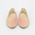 Close-up of pink and gold glitter doll shoes for 18 inch American Girl dolls with black soles - Light Pink