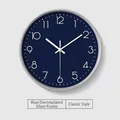Classic round wall clock featuring a navy blue dial with a sleek silver plated frame - Blue Silver Frame