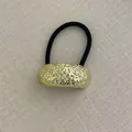 Elastic hair tie featuring a golden hammered metal geometric charm in a retro style - Extra Large Single Layer Wrinkle Gold