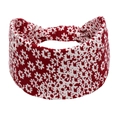 Detailed view of red floral yoga headband made of soft, stretchy fabric for women - Red Background With White Floral