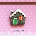 Detailed view of resin gingerbread house with green glitter for DIY crafts and ornaments - Brown House