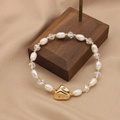 Elegant natural pearl and faceted crystal beaded bracelet with gold accent charm - Crystal Spaced Elastic Bracelet