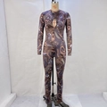 Close-up of chest cutout on shimmering bronze and purple metallic fluid print catsuit - M / Brown