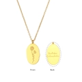 Golden necklace with oval floral pendant showing front and October Calendula engraving back - October Calendula