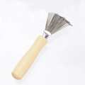 Hair brush cleaning tool with light wood handle and metal claws on white background - Lotus Wood/Stainless Steel / Natural Wood Color