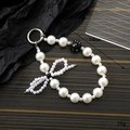 Elegant pearl bow keychain charm with silver spring clasp for bags and phone cases - 13 Pearls White Bow Style (K3018) / White