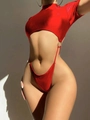 Detail of red hollow bodysuit bikini featuring waist cut-outs and metal ring accents - S / Red