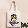 Detail of One Spooky Mama print on cream canvas tote bag with Halloween pumpkin motif - One Spooky Mama Print