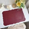 Elegant wine red leather placemat with European embossed patterns and wavy edges - Embossed Totem Red