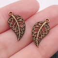 Antique bronze alloy leaf charms with hollow filigree design for jewelry DIY - Antique Bronze