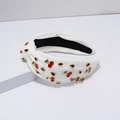 White knotted fabric headband with golden-edged red cherries and sparkling rhinestones - Cherry Style