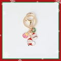 Portachiavi natalizio con Babbo Natale, pupazzo di neve e ciondoli in smalto su base oro - Regalo e Corona