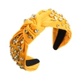 Macro detail of yellow fabric knotted headband with sparkling clear rhinestones - Yellow