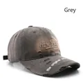 Vintage grey baseball cap featuring 3D New York embroidery and distressed fabric details - Gray