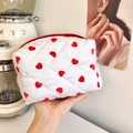 Quilted white cosmetic bag with red hearts featuring a soft padded texture and zipper - White Quilted Heart Style