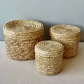 Three-piece set of round hand-woven straw storage baskets with lids in natural color - Straw Box