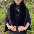 Elegant black knit poncho with fluffy faux fur collar and tassels for autumn winter warmth - Black