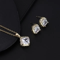 Golden titanium steel jewelry set featuring square clear stones with halo accents - Gold Square Clear Stone Set (U)