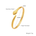 Macro detail of gold stainless steel snake cuff with 5mm width and high polished finish - Snake Scale Texture Cuff Bangle / Gold