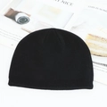 Classic black knitted beanie with ribbed cuff for winter warmth and outdoor style - Black