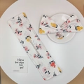 Floral print hair bun maker and bow scrunchie set in white fabric with petal patterns - White Base Floral
