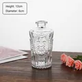Retro relief transparent glass vase with floral emblem and dimensions 12cm by 6cm - High Relief
