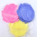 Three-pack octopus bath toys in pink, blue, and yellow with individual clear packaging - Squeeze Frisbee 3pcs