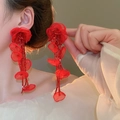 Detail of red fabric flower earrings with long pearl tassel fringe on model's ear - 110# Silver Needle - Red
