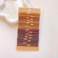 Set of 12 earth tone hair ties with various textures on a white display card - Light Deep Coffee Combination Set