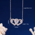 Collana con doppio cuore in argento e acciaio inossidabile con zirconi scintillanti - Cuore 1012