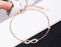Pulsera infinito de acero inoxidable oro rosa con cristales brillantes y cierre ajustable - Pulsera de Oro Rosa (M209)