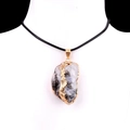Irregular white crystal stone pendant necklace with gold plated edge and black cord - Moonstone