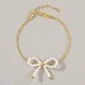 Bracciale placcato oro 18K con fiocco di perle finte bianche e catena a doppio filo - Fiocco Intrecciato Bianco Catena Dorata
