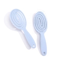 Pair of light blue hollow-out vent hairbrushes with non-slip handles for styling - Oval Sky Blue