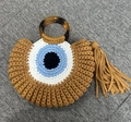Handwoven semi-circle cotton rope bag with blue eye pattern and fringe tassels - Ginger Yellow with Tassel