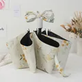 Three-fold manual umbrella with beige floral pattern and a decorative ribbon handle bow - 3-Fold Manual Style - Yellow Bell Flower