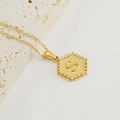 Golden hexagonal necklace featuring embossed letter S with beaded edge details - Letter S (Single Pendant)
