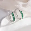 Exquisite silver hoop earrings with square-cut emerald stones and detailed openwork design - Nano Emerald