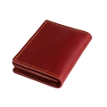 Close-up of red crazy horse leather card holder with thick yellow contrast stitching - Red