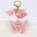 Pink sequin alphabet W keychain with tassel and butterfly pendant for bags - Letter W