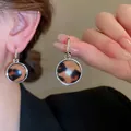 Vintage leopard print hoop earrings with silver pins and minimalist geometric circular design - Silver Brown Drop (33)