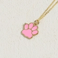 Elegant gold necklace featuring a pink enamel cat paw print pendant for women - Pink