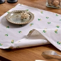 Modern minimalist cotton linen napkin featuring yellow lemon print on white background - Mini Lemon